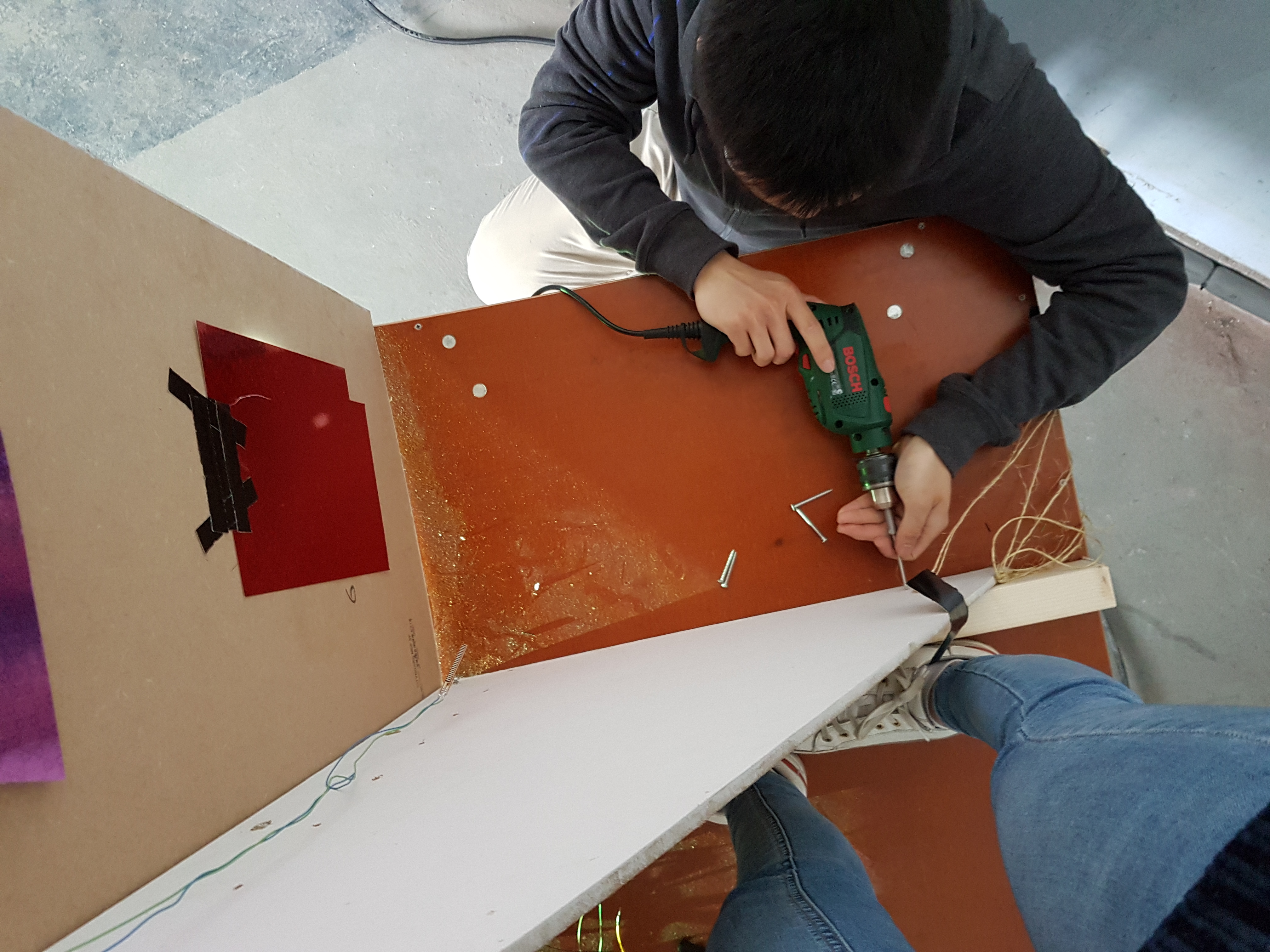 driving screws into support planks