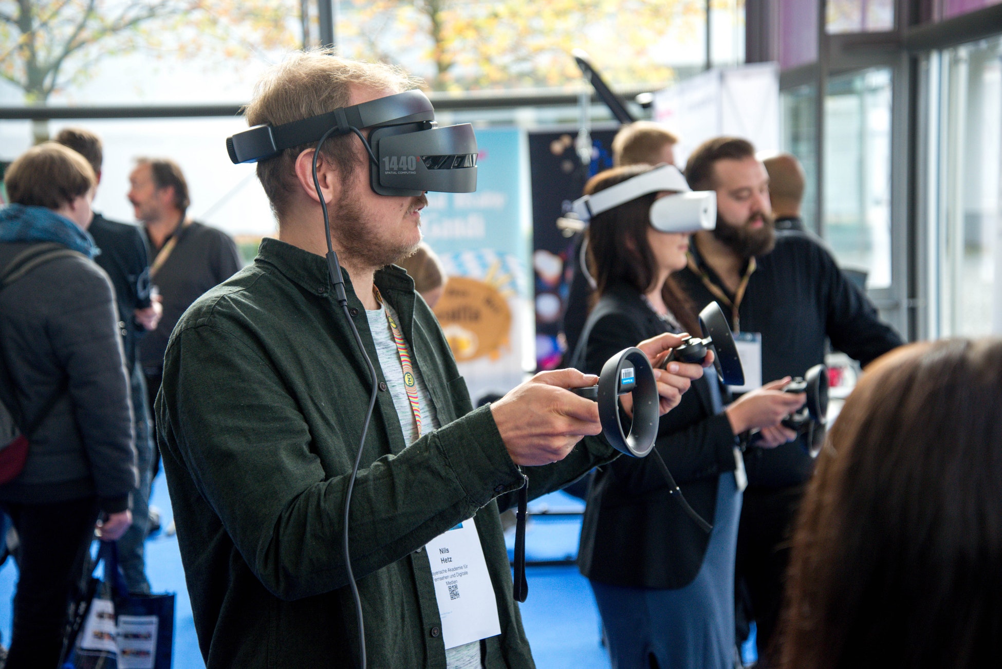 another guy wearing vr goggles
