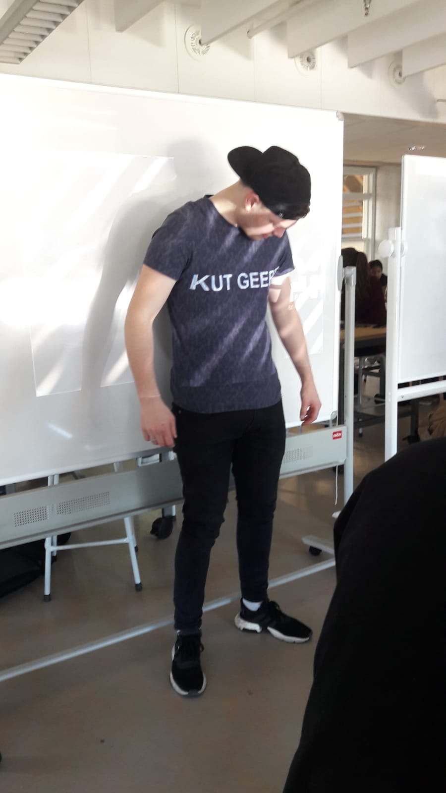our friend geert with text on his shirt